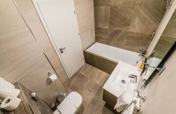 Фото номера Апартаменты с 2 спальнями Апарт-отели UBA Accommodation Aparthotel г. Клуж-Напока 7