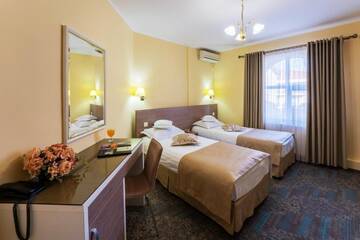 Фото номера Двухместный номер с 1 кроватью или 2 отдельными кроватями Отель Hotel Stil г. Клуж-Напока 11