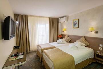 Фото номера Двухместный номер с 1 кроватью или 2 отдельными кроватями Отель Hotel Stil г. Клуж-Напока 16
