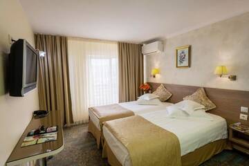 Фото номера Двухместный номер с 1 кроватью или 2 отдельными кроватями Отель Hotel Stil г. Клуж-Напока 4