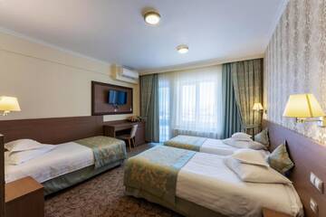 Фото номера Трехместный номер Отель Hotel Stil г. Клуж-Напока 4