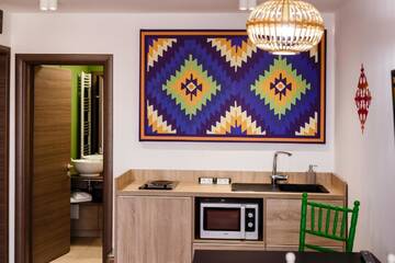 Фото номера Улучшенный номер-студио Отель Aparthotel Gutinului г. Клуж-Напока 5