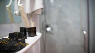 Фото номера Бюджетный двухместный номер с 2 отдельными кроватями Отель Hotel Transilvania г. Клуж-Напока 2