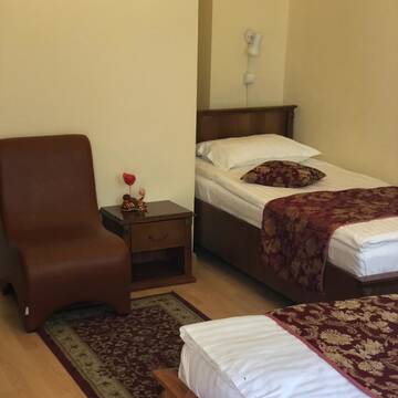 Фото номера Бюджетный двухместный номер с 2 отдельными кроватями Отель Hotel Transilvania г. Клуж-Напока 11