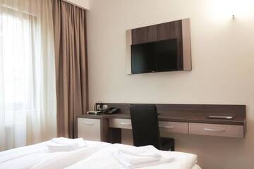 Фото номера Стандартный двухместный номер с 2 отдельными кроватями Отель Hotel Rao г. Клуж-Напока 8
