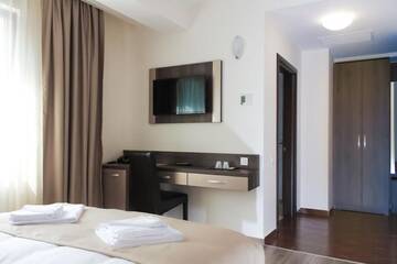 Фото номера Стандартный двухместный номер с 2 отдельными кроватями Отель Hotel Rao г. Клуж-Напока 9