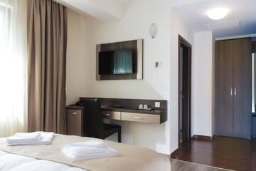 Фото номера Стандартный двухместный номер с 2 отдельными кроватями Отель Hotel Rao г. Клуж-Напока 4