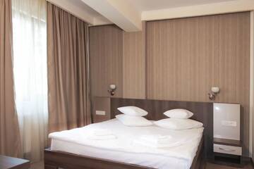 Фото номера Стандартный двухместный номер с 1 кроватью Отель Hotel Rao г. Клуж-Напока 4