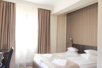 Фото номера Стандартный двухместный номер с 2 отдельными кроватями Отель Hotel Rao г. Клуж-Напока 6