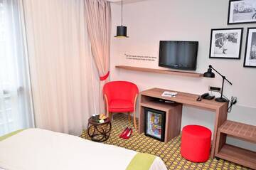 Фото номера Стандартный одноместный номер Отель Hotel Capitolina City Chic г. Клуж-Напока 11