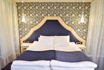 Фото номера Двухместный номер Делюкс с 1 кроватью Отель Hotel Capitolina City Chic г. Клуж-Напока 4