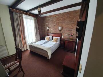 Фото номера Стандартный двухместный номер с 1 кроватью Отель Atrium Boutique Hotel Cluj City Center г. Клуж-Напока 11