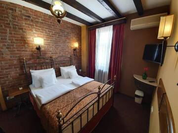 Фото номера Стандартный двухместный номер с 1 кроватью Отель Atrium Boutique Hotel Cluj City Center г. Клуж-Напока 19