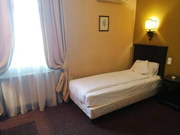 Фото номера Стандартный одноместный номер Отель Atrium Boutique Hotel Cluj City Center г. Клуж-Напока 3