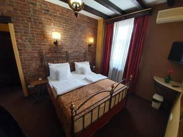 Фото номера Стандартный двухместный номер с 1 кроватью Отель Atrium Boutique Hotel Cluj City Center г. Клуж-Напока 7