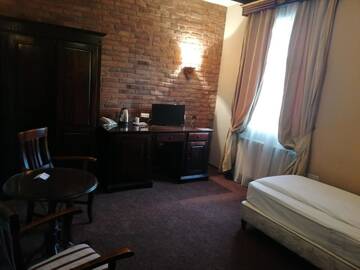 Фото номера Стандартный одноместный номер Отель Atrium Boutique Hotel Cluj City Center г. Клуж-Напока 4