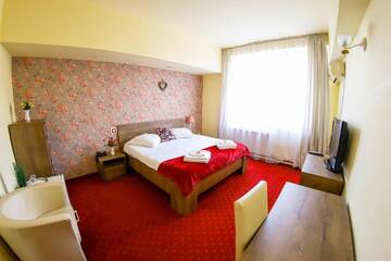 Фото номера Двухместный номер Делюкс с 1 кроватью Отель Hotel Olimp г. Клуж-Напока 8