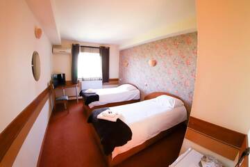 Фото номера Двухместный номер с 2 отдельными кроватями Отель Hotel Olimp г. Клуж-Напока 2