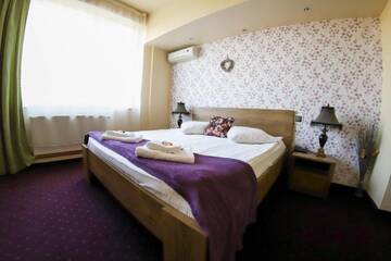 Фото номера Двухместный номер Делюкс с 1 кроватью Отель Hotel Olimp г. Клуж-Напока 12