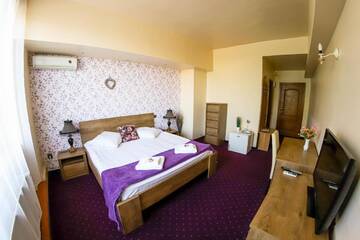 Фото номера Двухместный номер Делюкс с 1 кроватью Отель Hotel Olimp г. Клуж-Напока 13