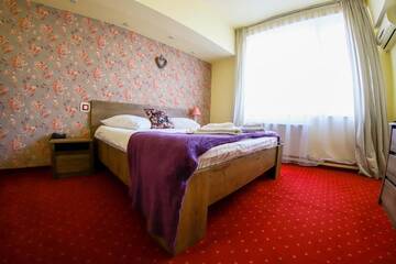 Фото номера Двухместный номер Делюкс с 1 кроватью Отель Hotel Olimp г. Клуж-Напока 10