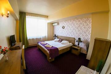 Фото номера Двухместный номер Делюкс с 1 кроватью Отель Hotel Olimp г. Клуж-Напока 11