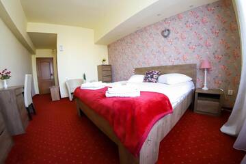 Фото номера Двухместный номер Делюкс с 1 кроватью Отель Hotel Olimp г. Клуж-Напока 7